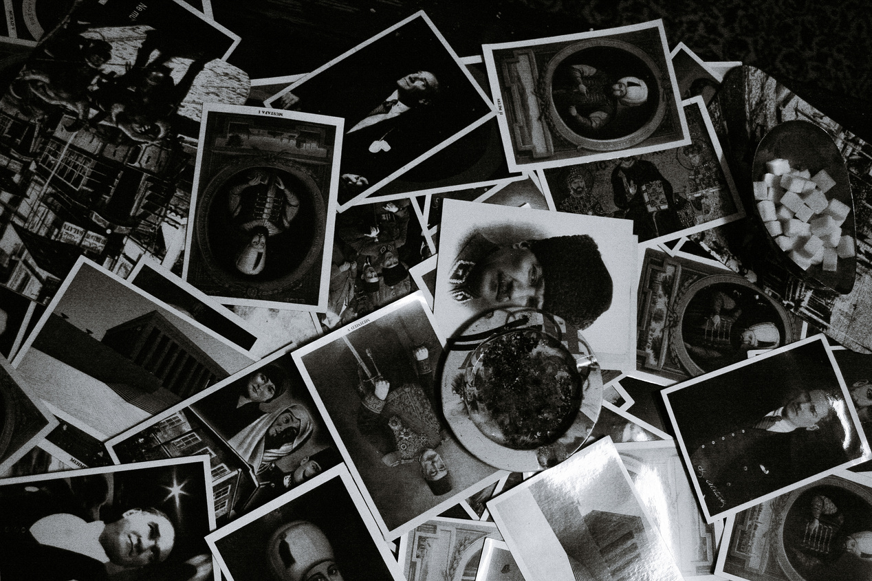 Photography collection on table with plate and sugar cubes