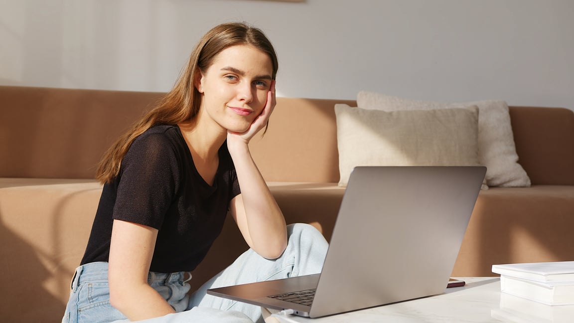 Young Woman Using Laptop 